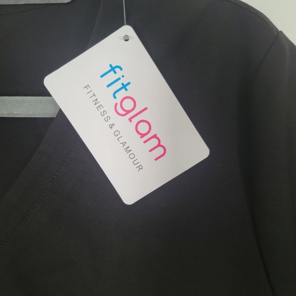 Scrub top in black. NEW with tags. - Picture 6 of 6